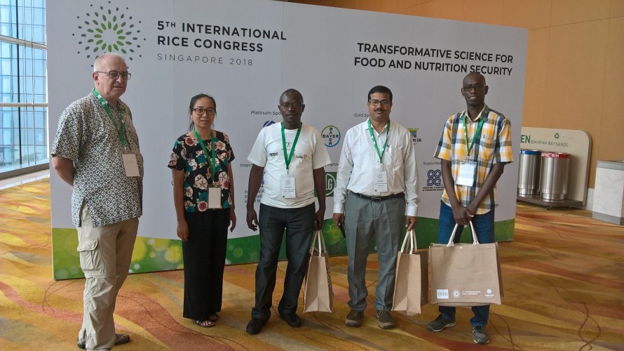 Louis Tchuma (middle) and Mame Birame Ndiaye (right) with colleagues and Sanjay Sethi from Phoenix company
